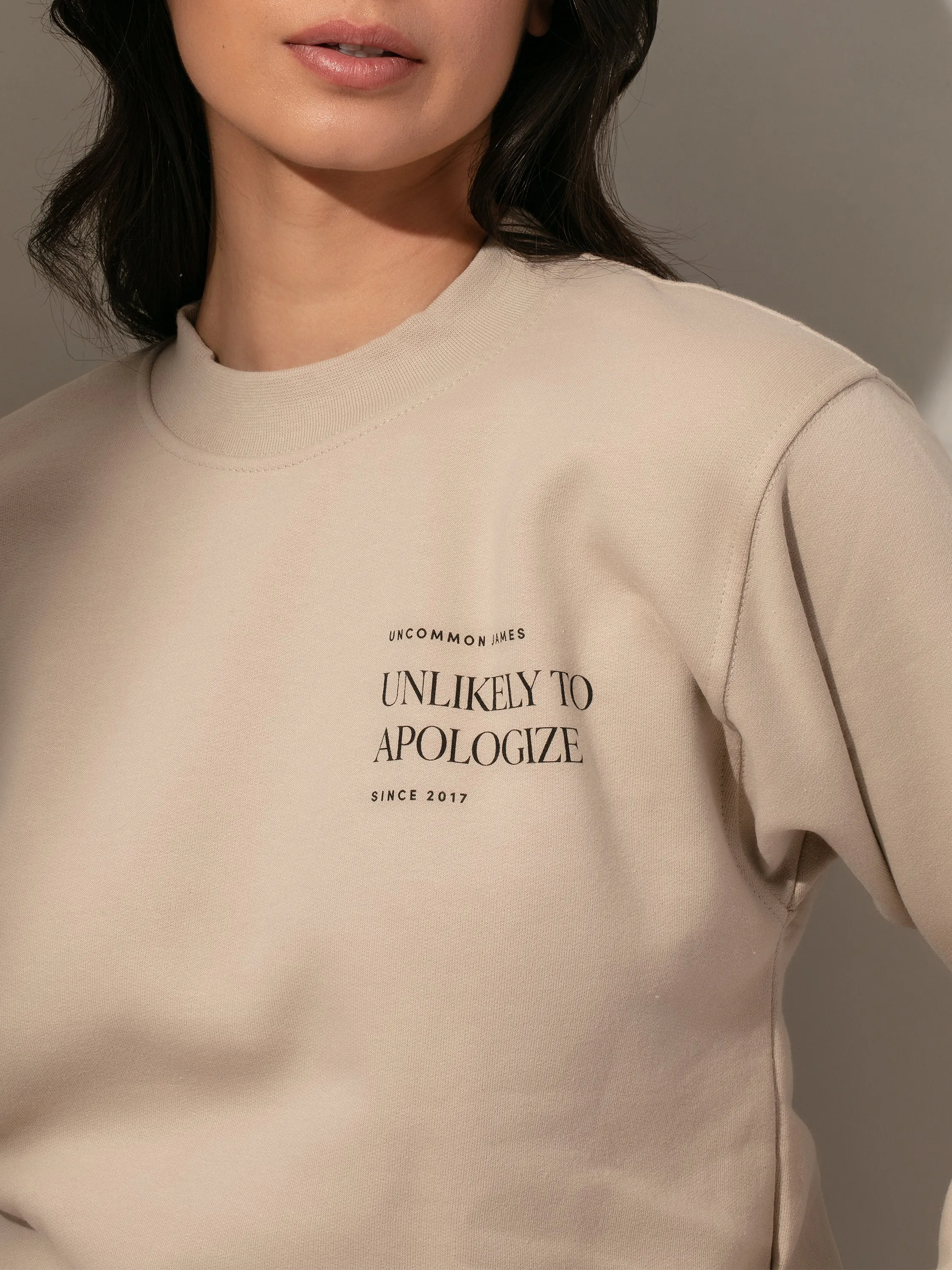 Unlikely to Apologize Sweatshirt