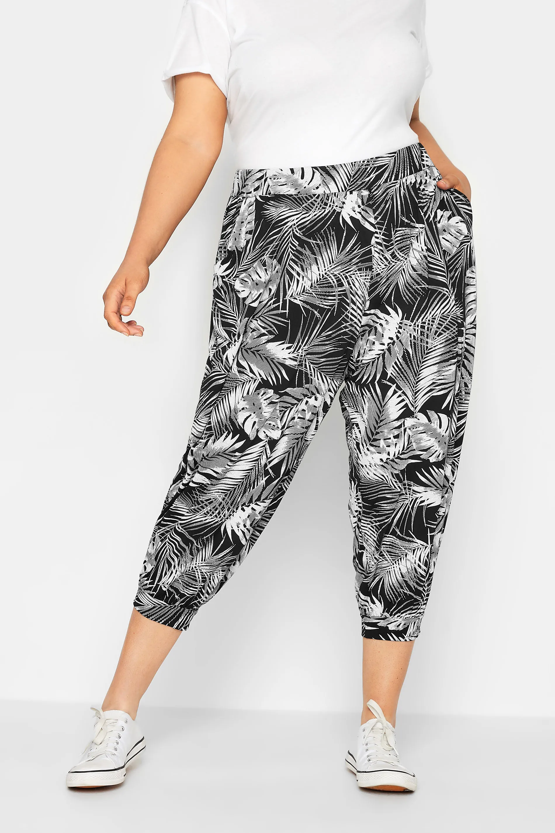 YOURS Curve Black Leaf Print Cropped Harem Trousers