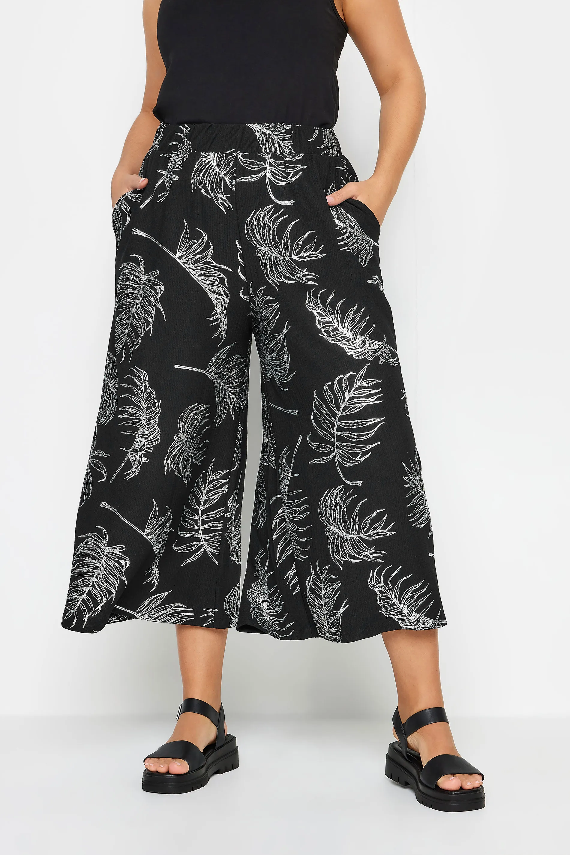 YOURS Curve Black Leaf Print Wide Leg Trousers