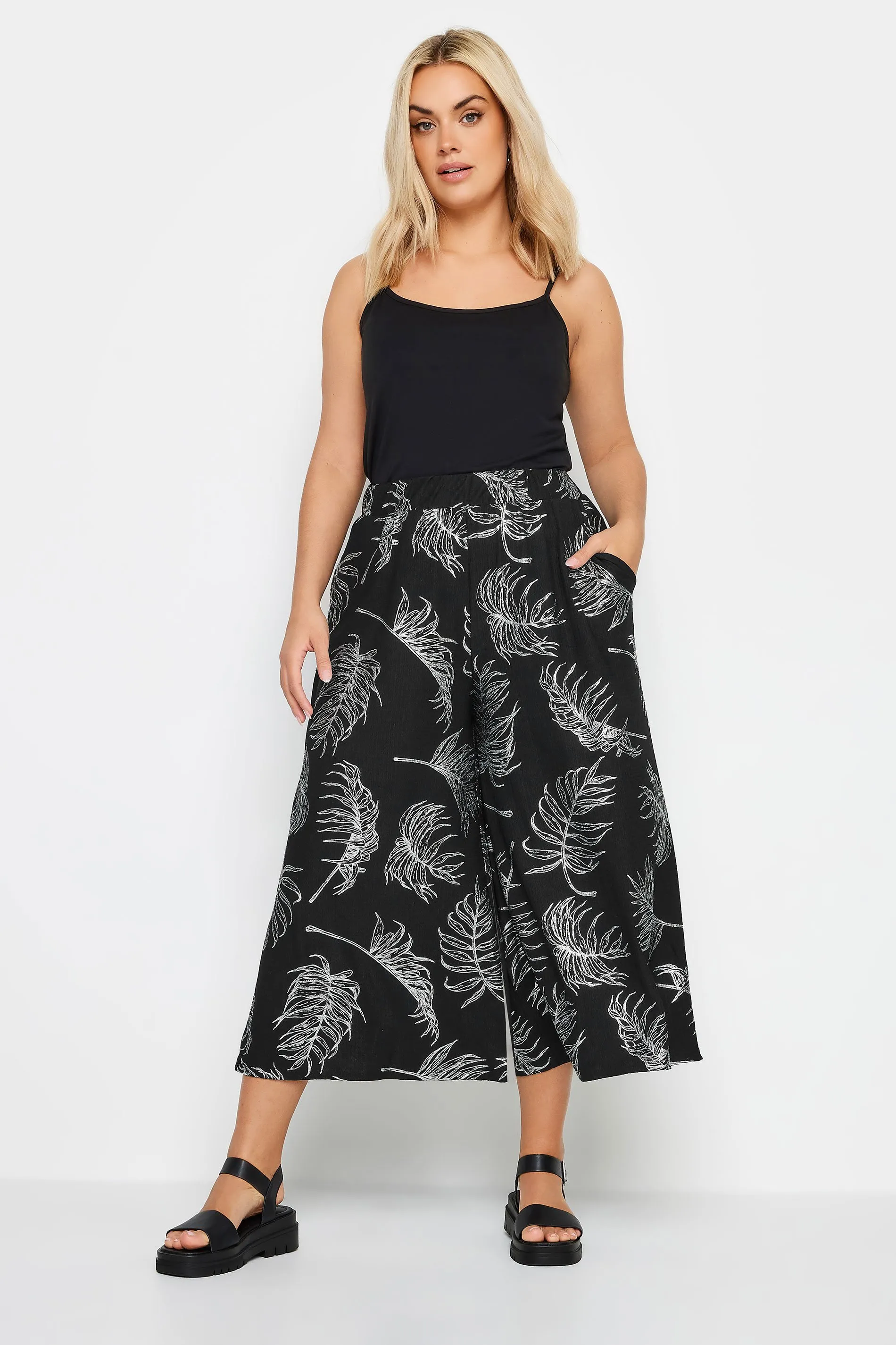 YOURS Curve Black Leaf Print Wide Leg Trousers