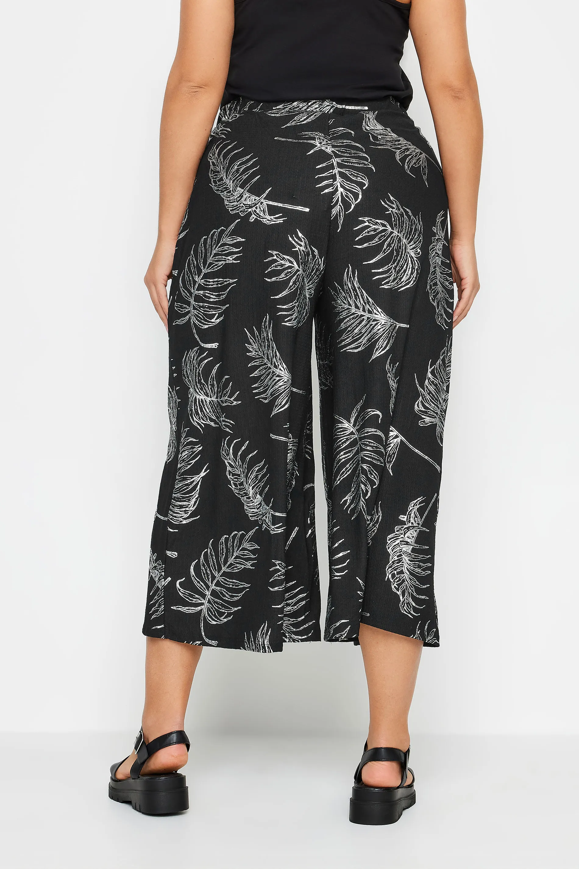 YOURS Curve Black Leaf Print Wide Leg Trousers