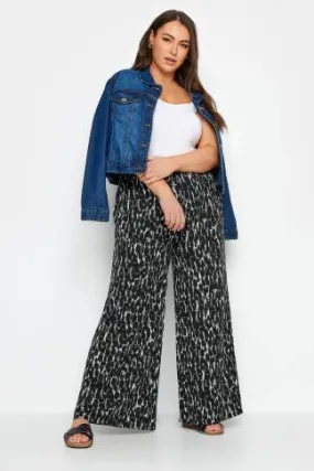 YOURS Curve Black Leopard Print Wide Leg Trousers