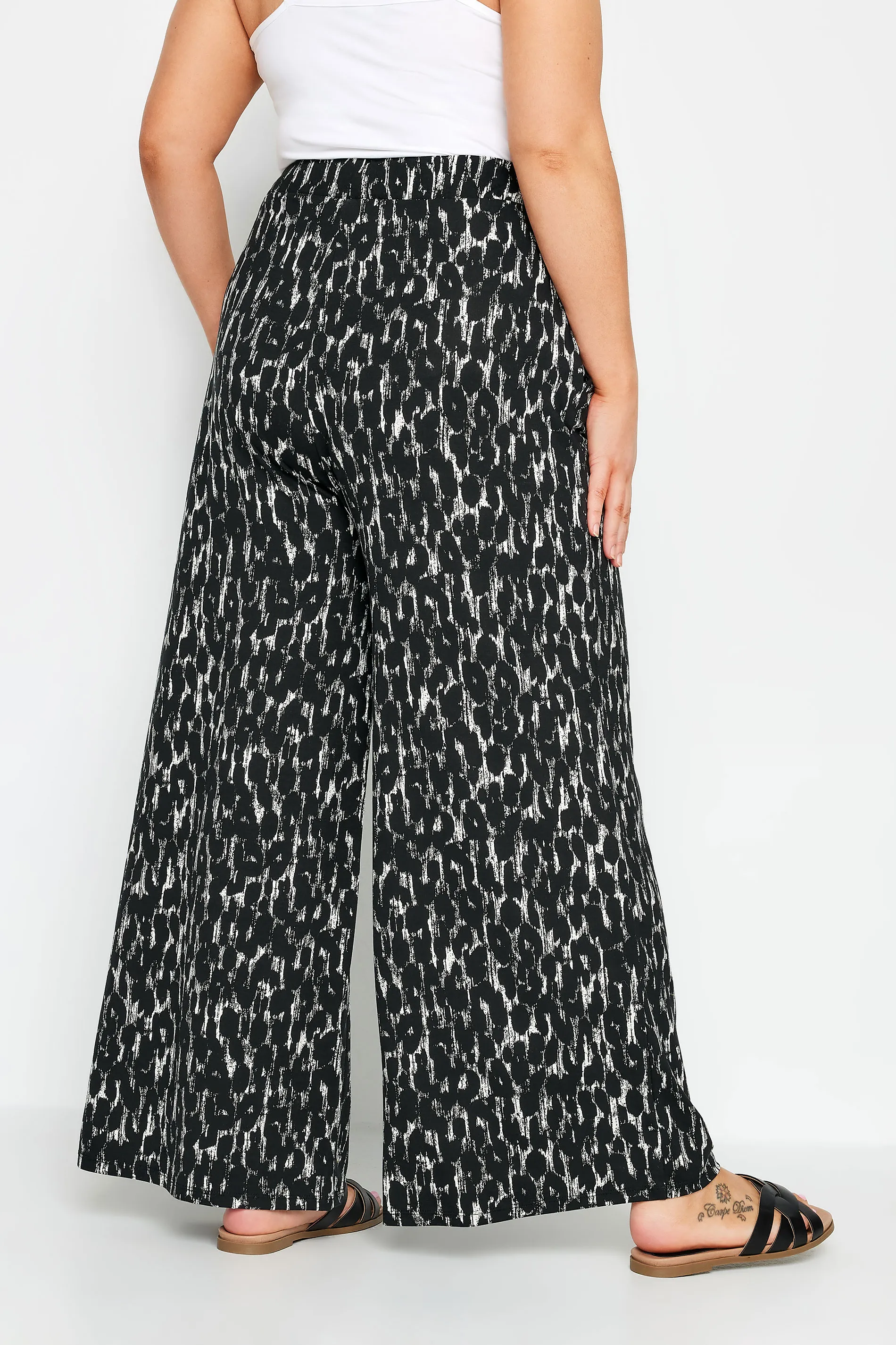 YOURS Curve Black Leopard Print Wide Leg Trousers