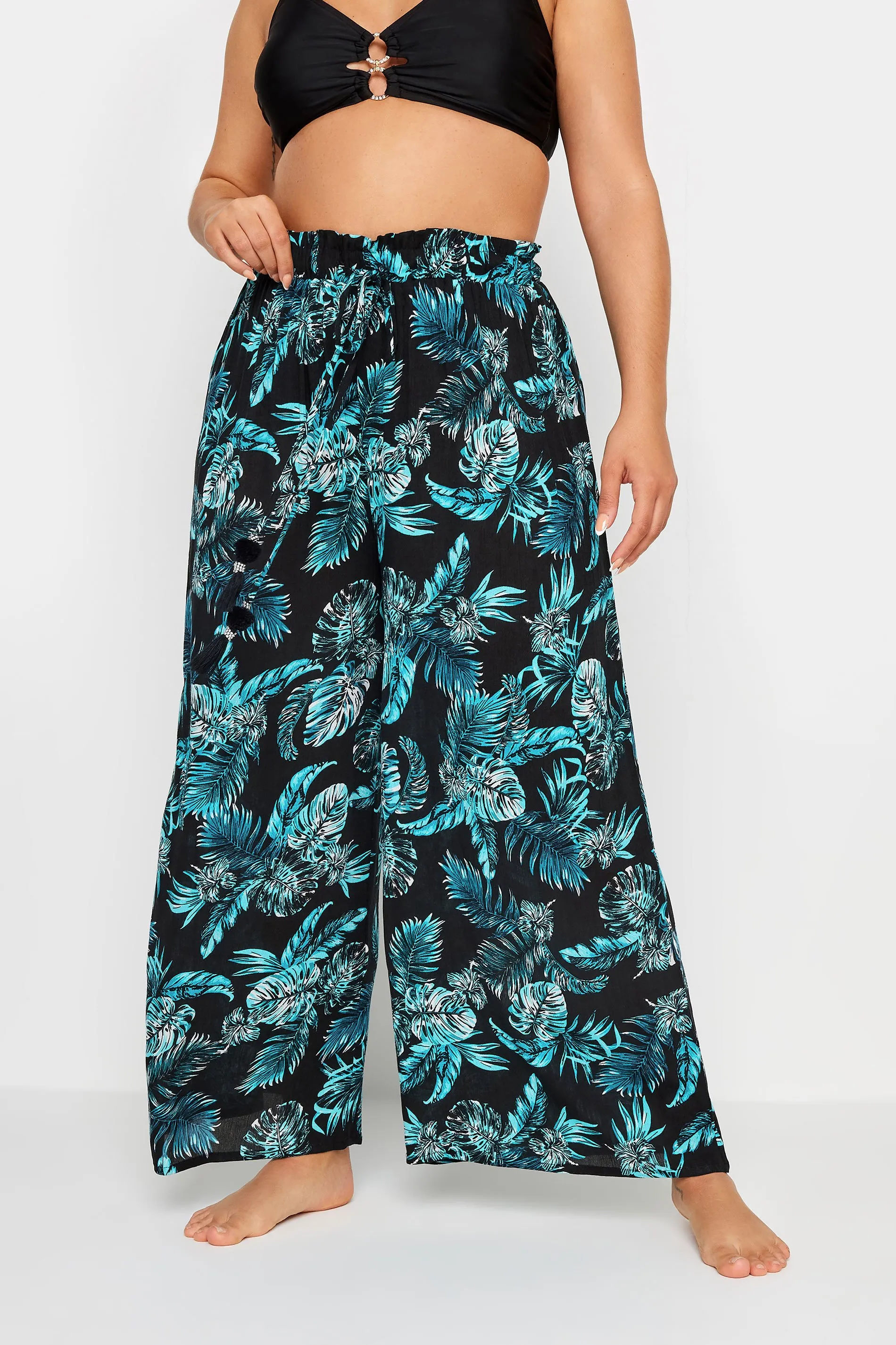 YOURS Curve Black Tropical Print Crinkle Tassel Trousers